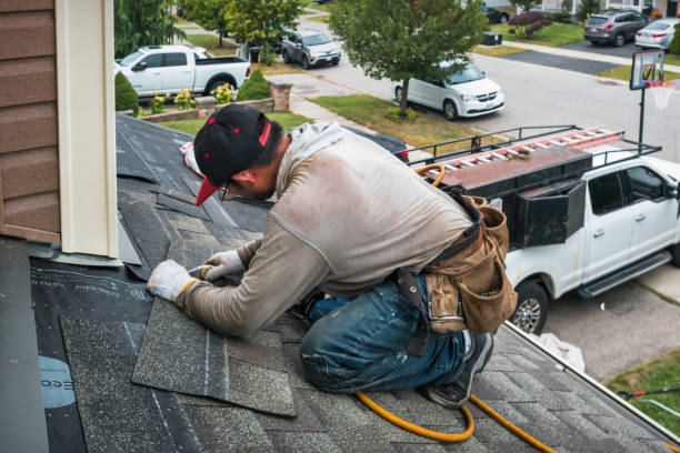 Professional Roofing technician working in Madison, NH